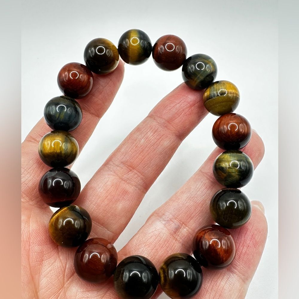 12mm‎ red, black, blue, and yellow tigers eye stone stretchy bracelet!